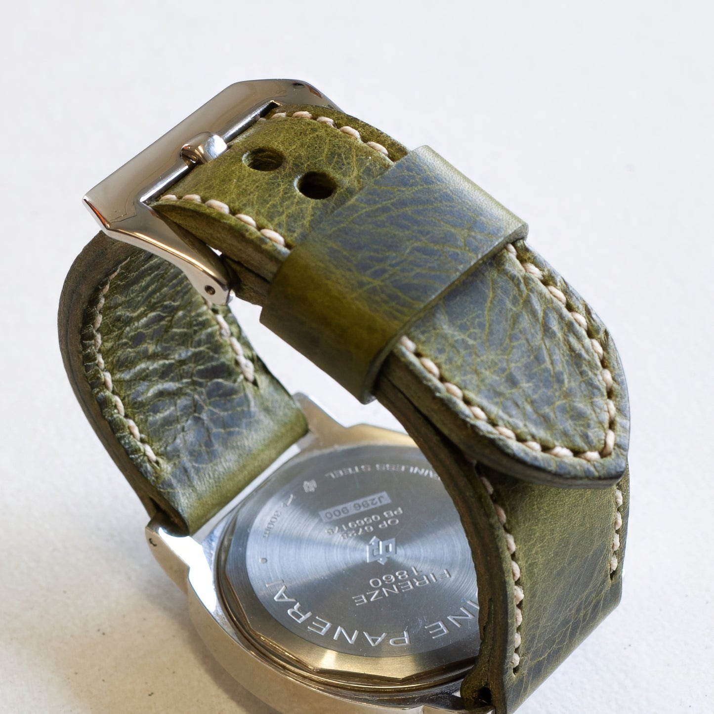 Antique Green leather watch strap with natural stitching and polished steel buckle