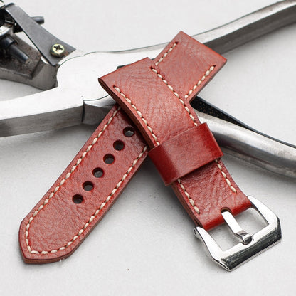 Arancio leather watch strap with natural stitching and polished steel buckle