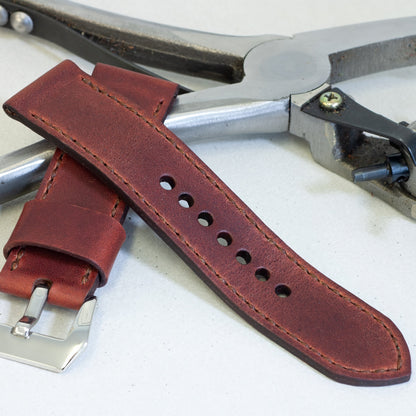 Autumn Leaf leather watch strap with light brown stitching and polished steel buckle