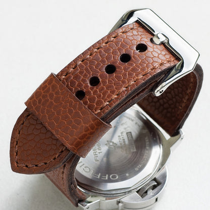 Bacchus leather watch strap with light brown stitching and polished steel buckle