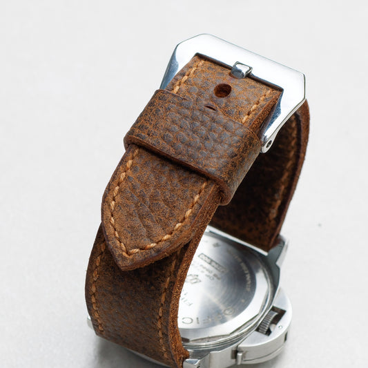 Badlands leather watch strap with butterscotch stitching and polished steel buckle