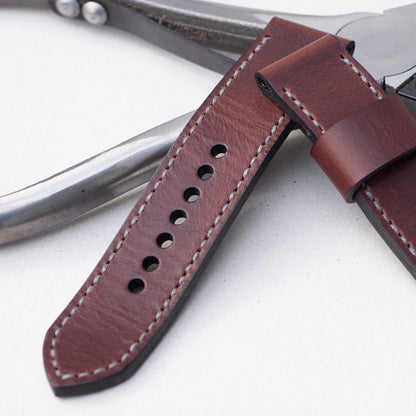 Brutal leather watch strap with grey stitching and polished steel buckle
