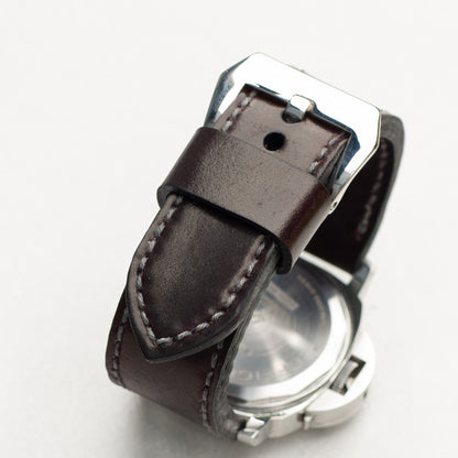 Burgundy Shell Cordovan leather watch strap with grey stitching and polished steel buckle