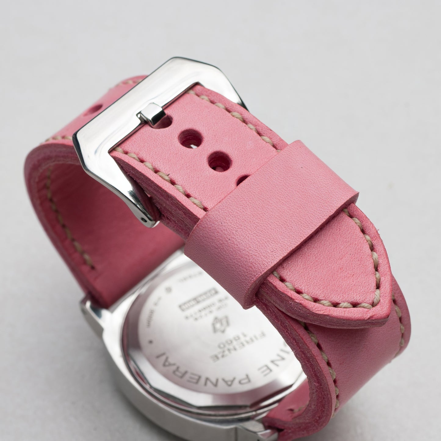 Candy leather watch strap with natural stitching and polished steel buckle