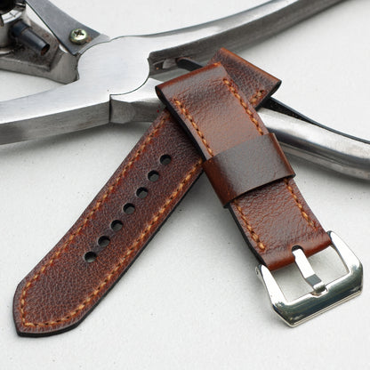 Cerberus leather watch strap with butterscotch stitching and polished steel buckle