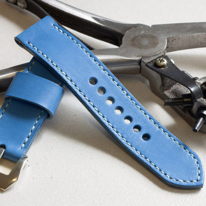 Cobalt Blue leather watch strap with pale blue stitching and polished steel buckle