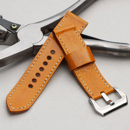 Crema leather watch strap with natural stitching and polished steel buckle
