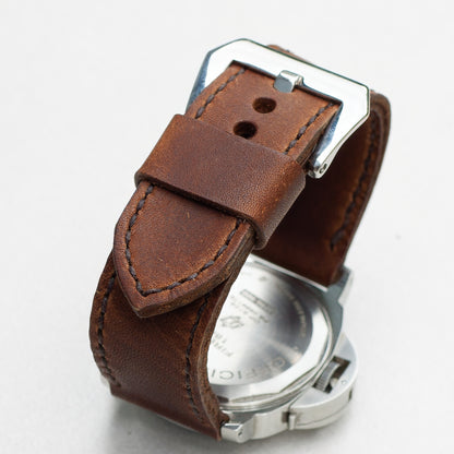 Dakota leather watch strap with dark brown stitching and polished steel buckle