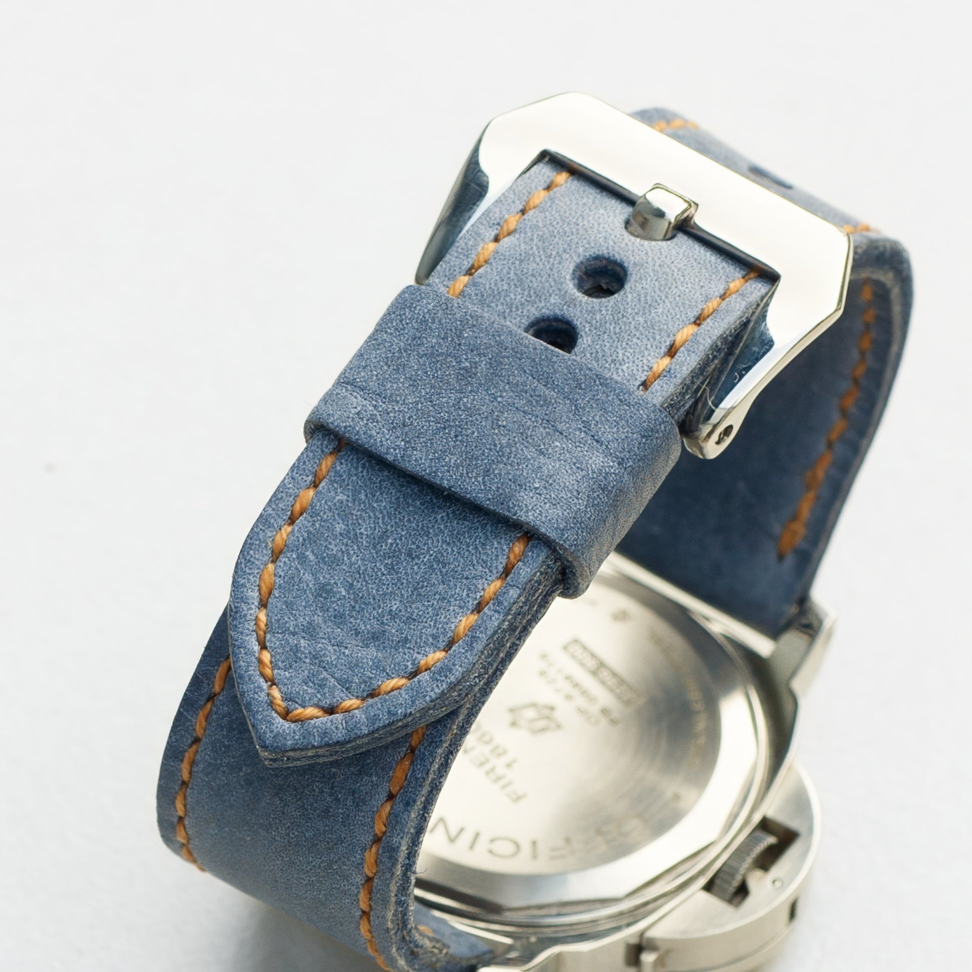 Denim leather watch strap with butterscotch stitching and polished steel buckle