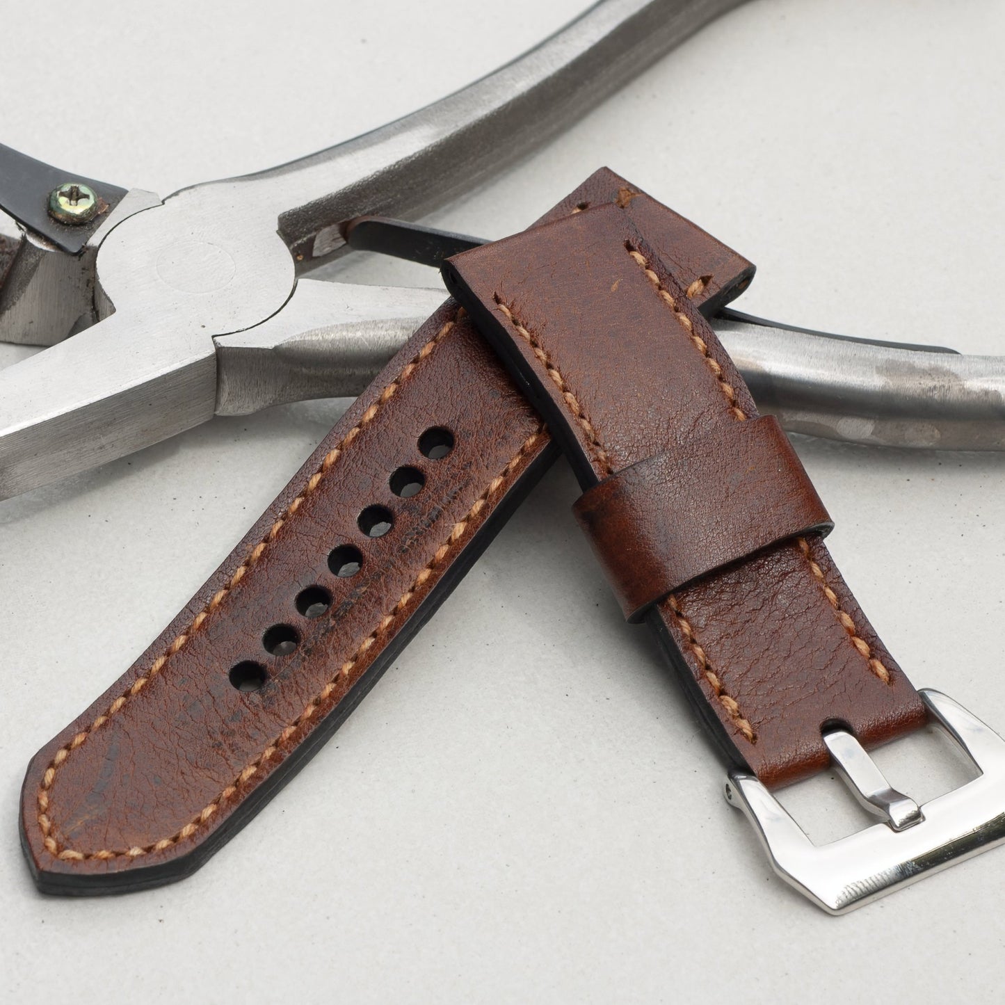 Emperor Kudu leather watch strap with butterscotch stitching and polished steel buckle