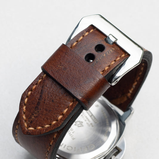 Emperor Kudu leather watch strap with butterscotch stitching and polished steel buckle