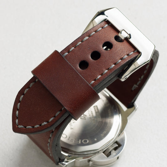 Espresso leather watch strap with grey stitching and polished steel buckle