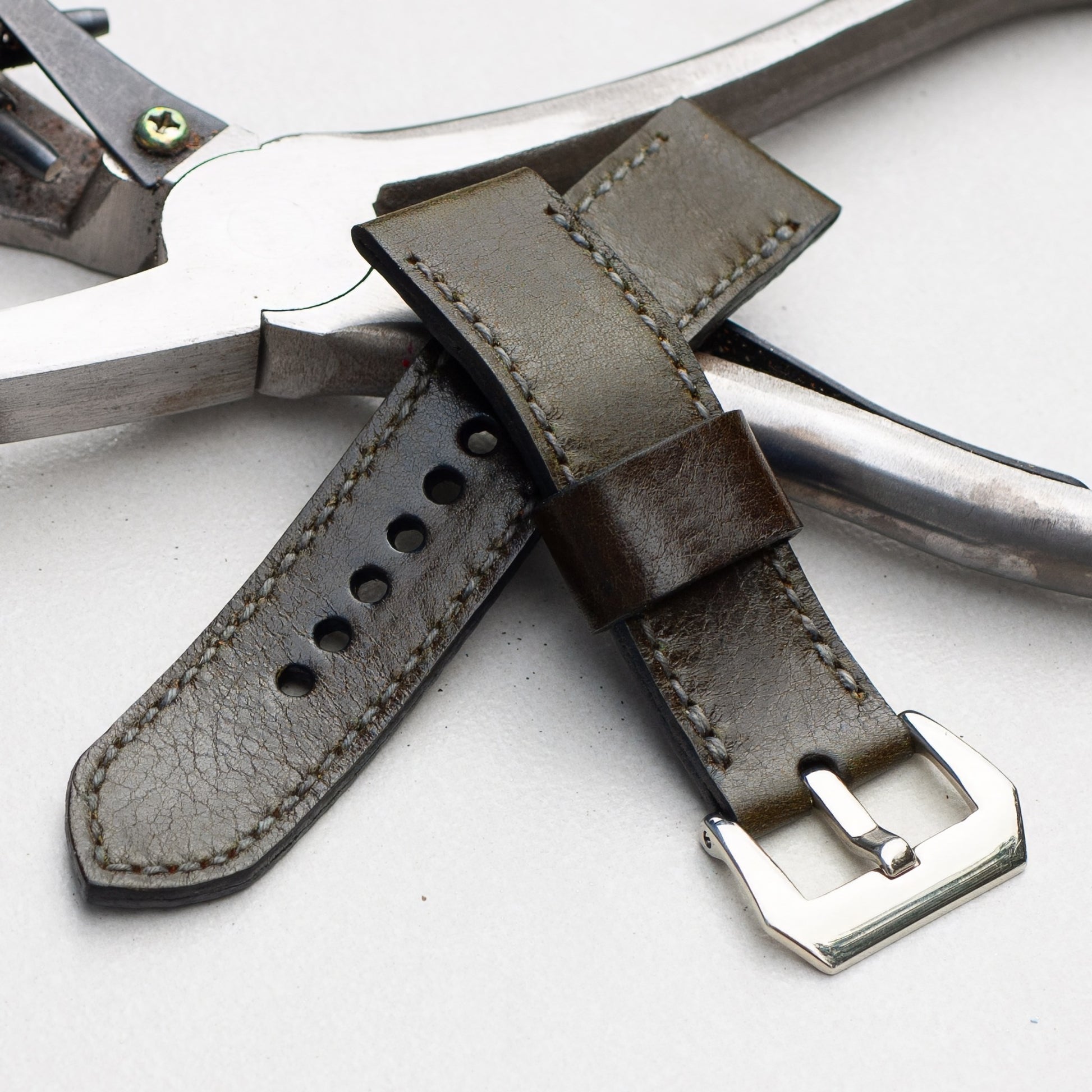 Forest Green leather watch strap with grey stitching and polished steel buckle