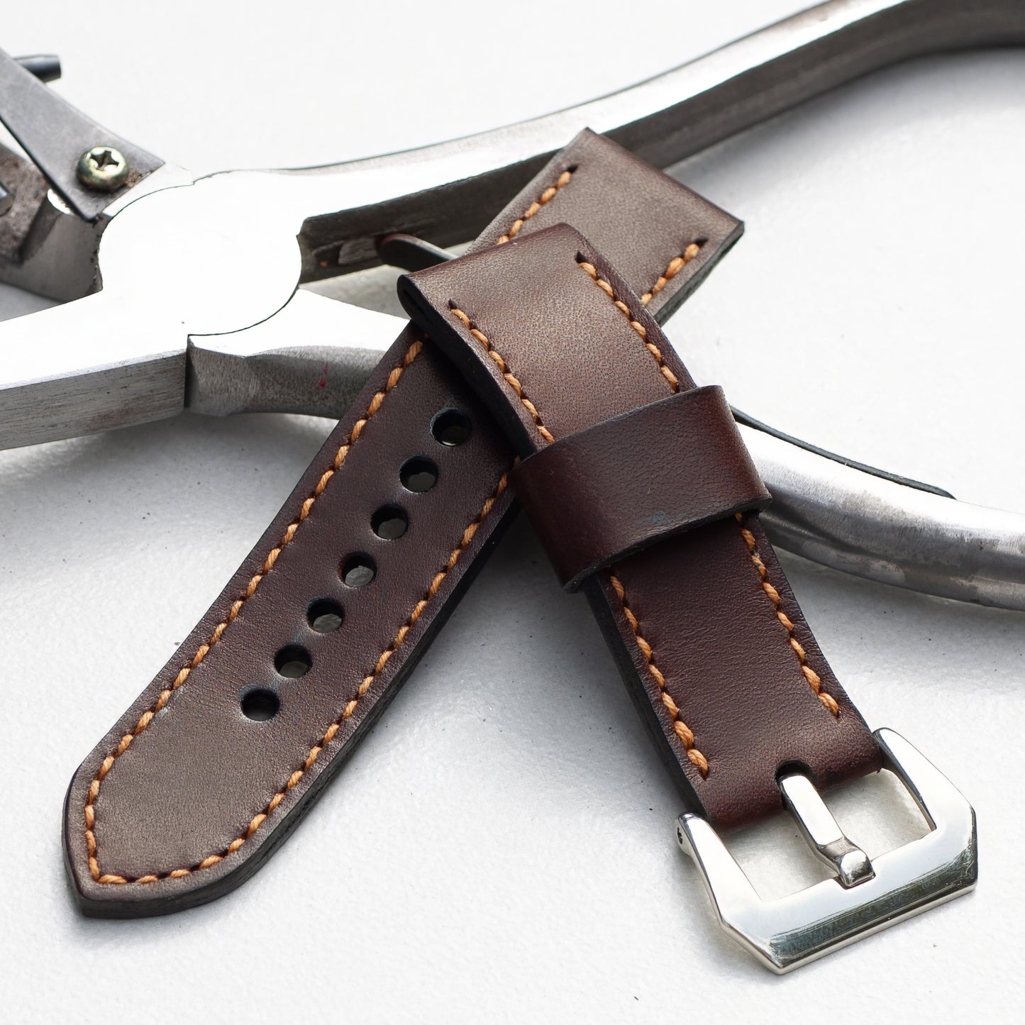 Havana leather watch strap with butterscotch stitching and polished steel buckle