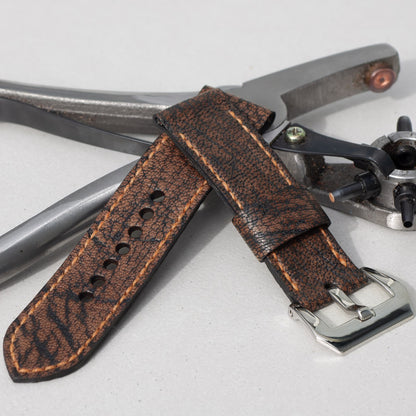 Heidrun leather watch strap with butterscotch stitching and polished steel buckle