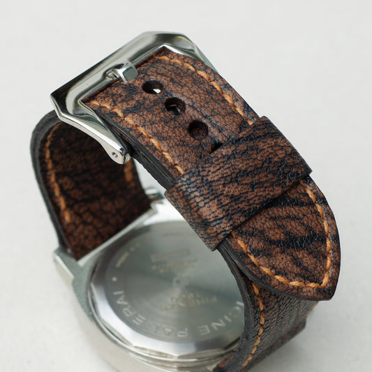 Heidrun leather watch strap with butterscotch stitching and polished steel buckle