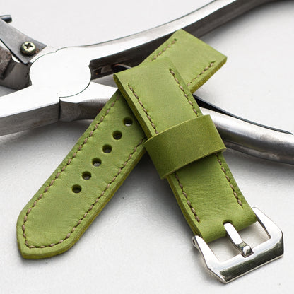 Lime leather watch strap with olive drab stitching and polished steel buckle