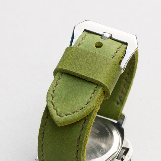 Lime leather watch strap with olive drab stitching and polished steel buckle