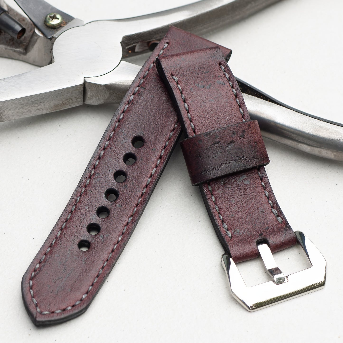 Merlot Kudu leather watch strap with grey stitching and polished steel buckle