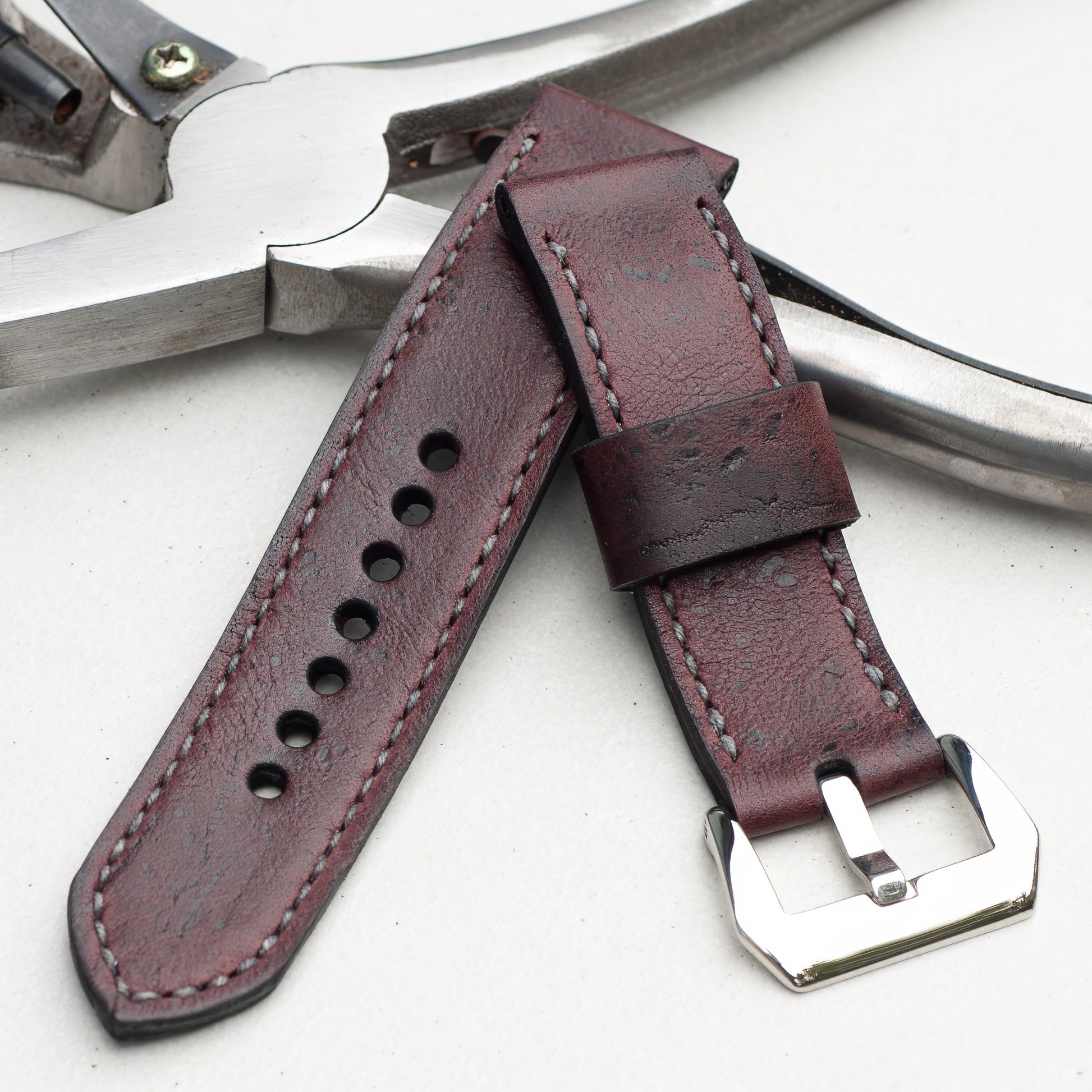 Merlot Kudu leather watch strap with grey stitching and polished steel buckle