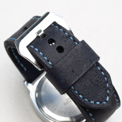 Midnight Kudu leather watch strap with pale blue stitching and polished steel buckle