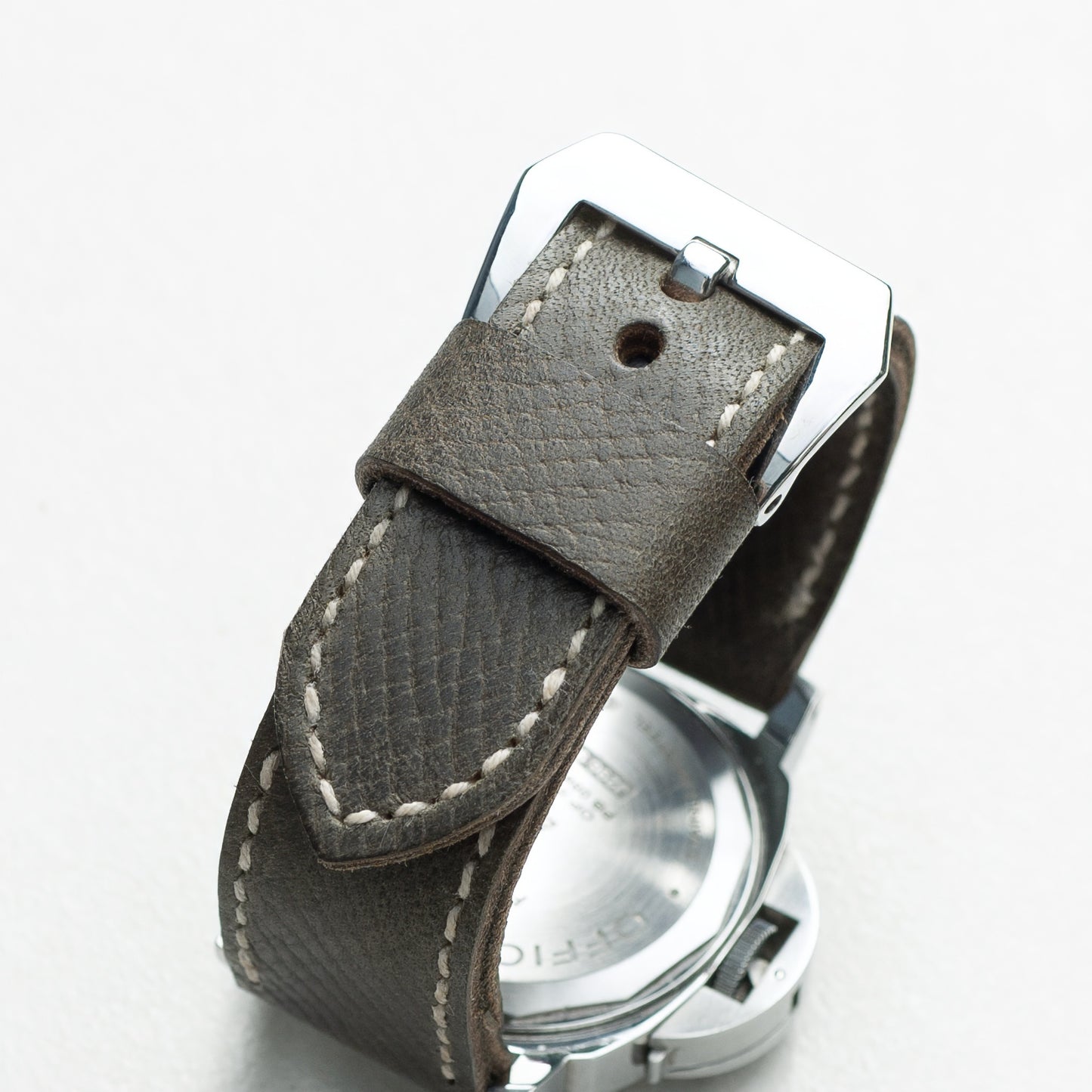 Moss Green leather watch strap with natural stitching and polished steel buckle