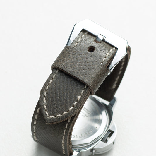 Moss Green leather watch strap with natural stitching and polished steel buckle