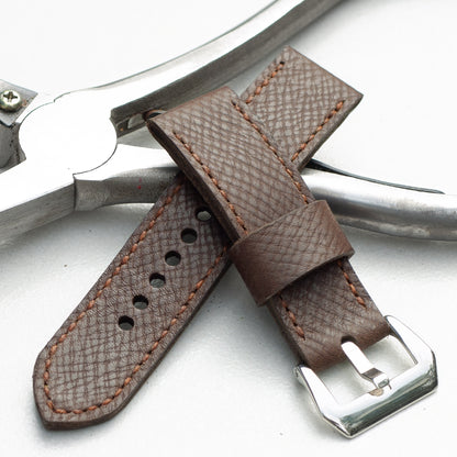 Mushroom leather watch strap with light brown stitching and polished steel buckle