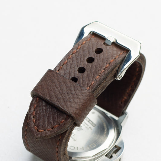 Mushroom leather watch strap with light brown stitching and polished steel buckle