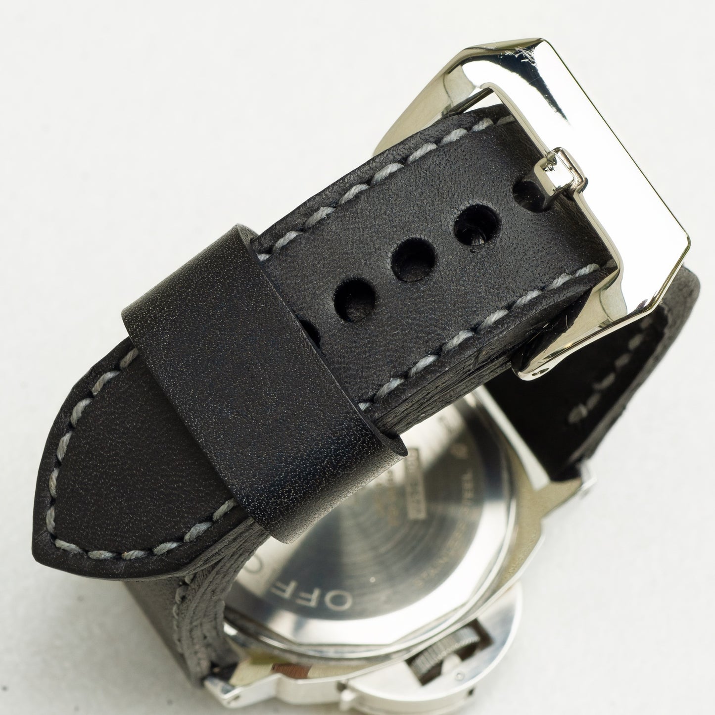 Nautilus leather watch strap with grey stitching and polished steel buckle