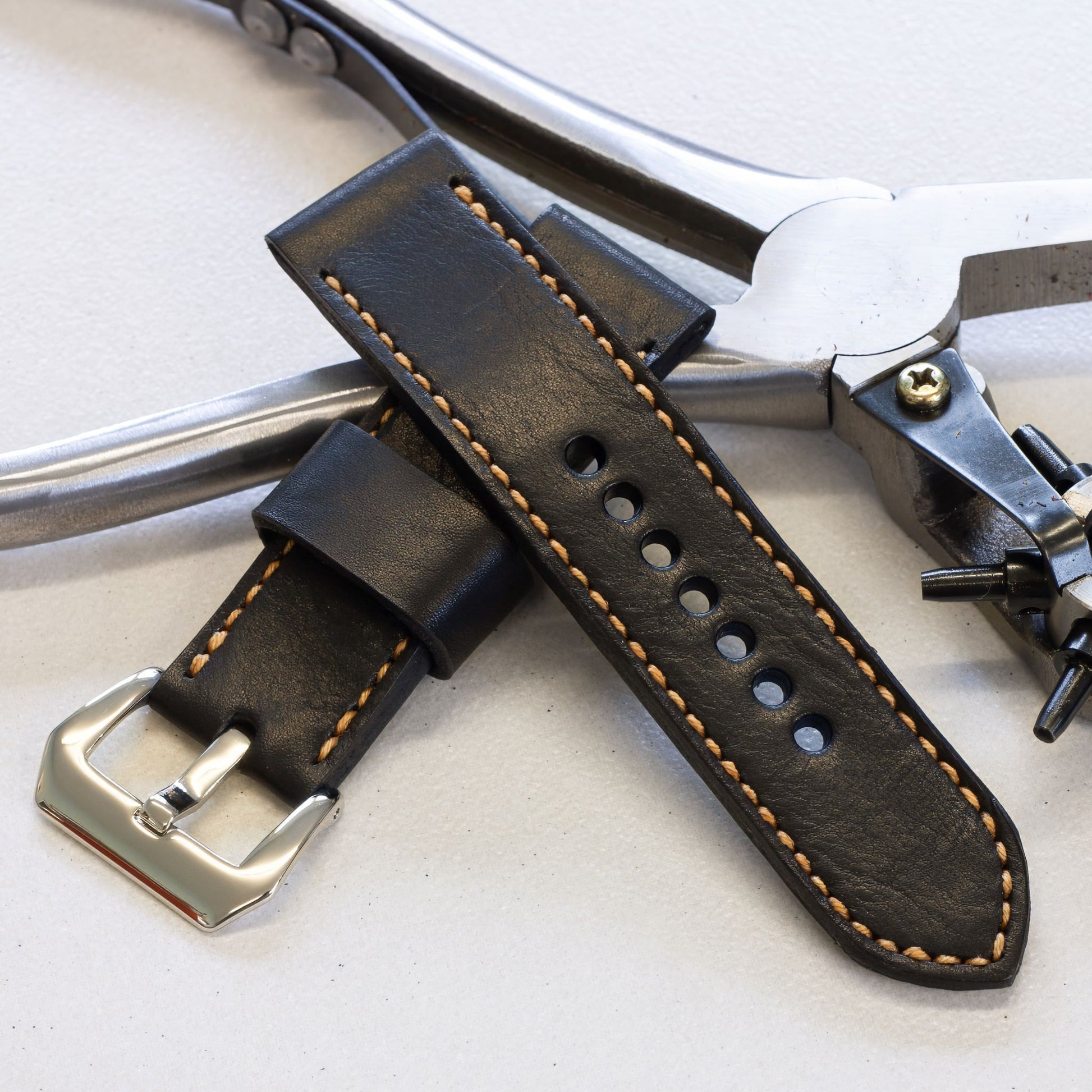 Nero leather watch strap with butterscotch stitching and polished steel buckle