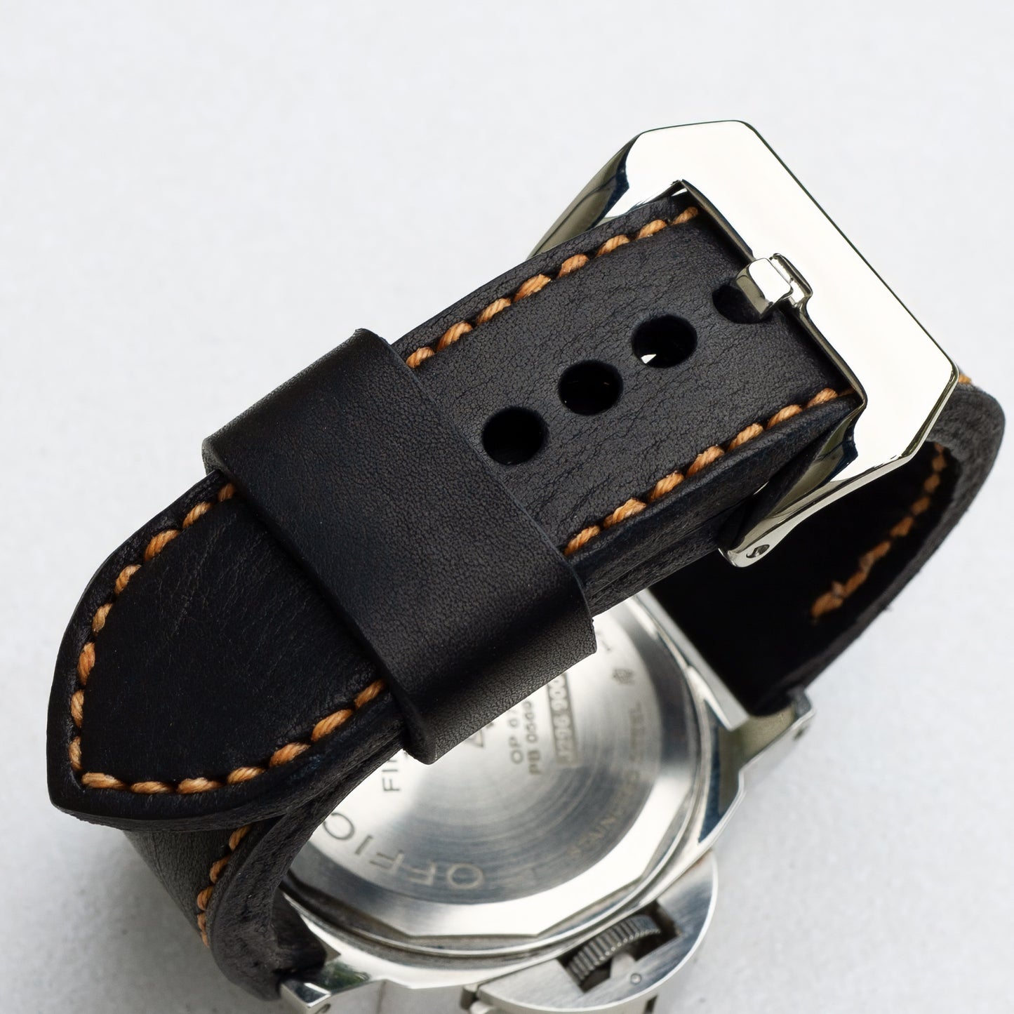 Nero leather watch strap with butterscotch stitching and polished steel buckle