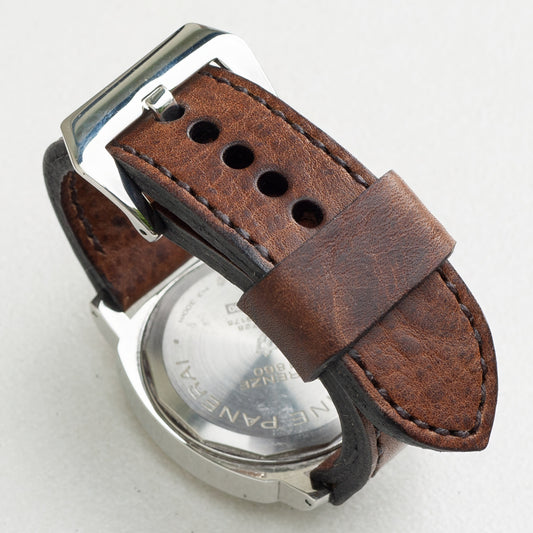 Horween Nut Brown leather watch strap with dark brown stitching and polished steel buckle