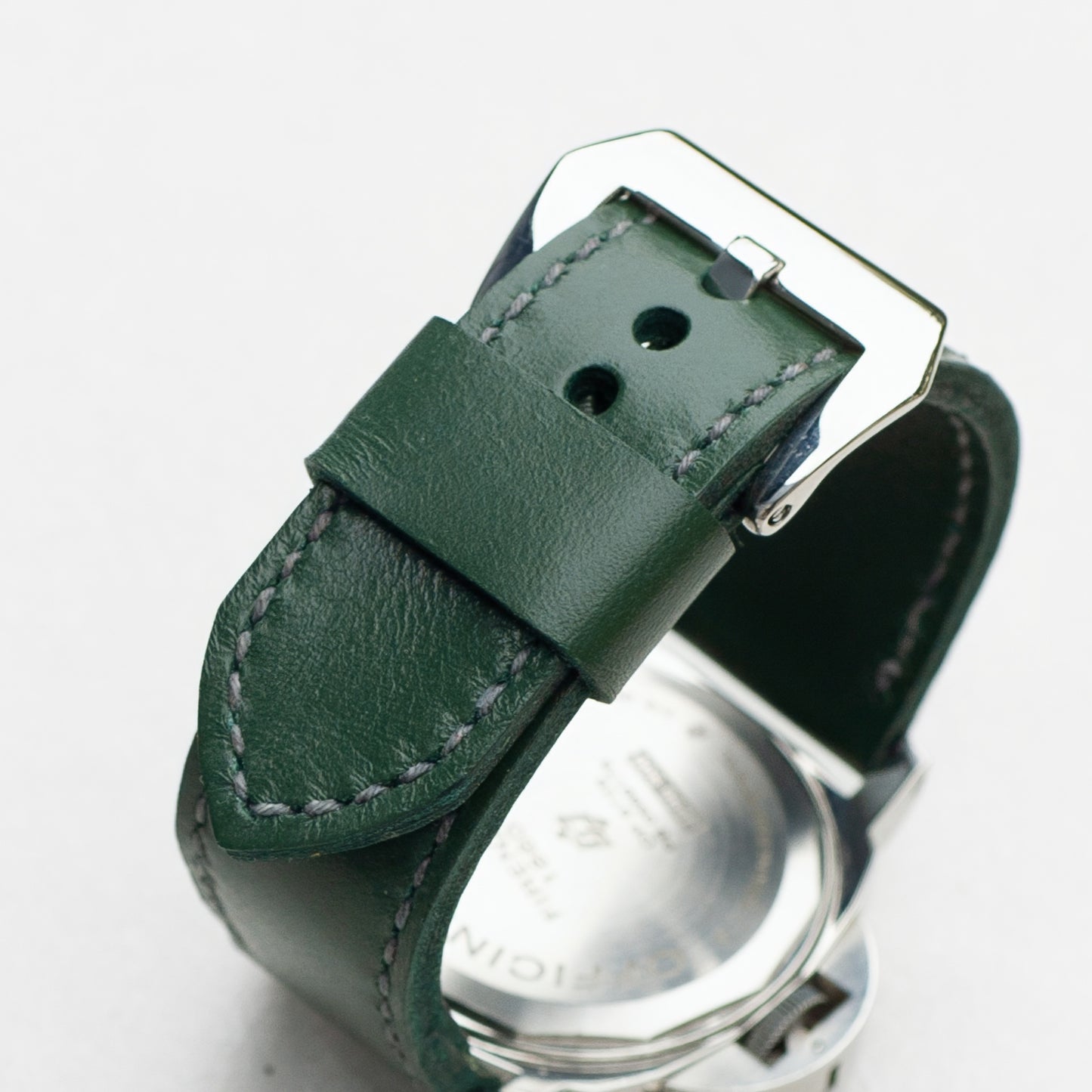Sage leather watch strap with grey stitching and polished steel buckle