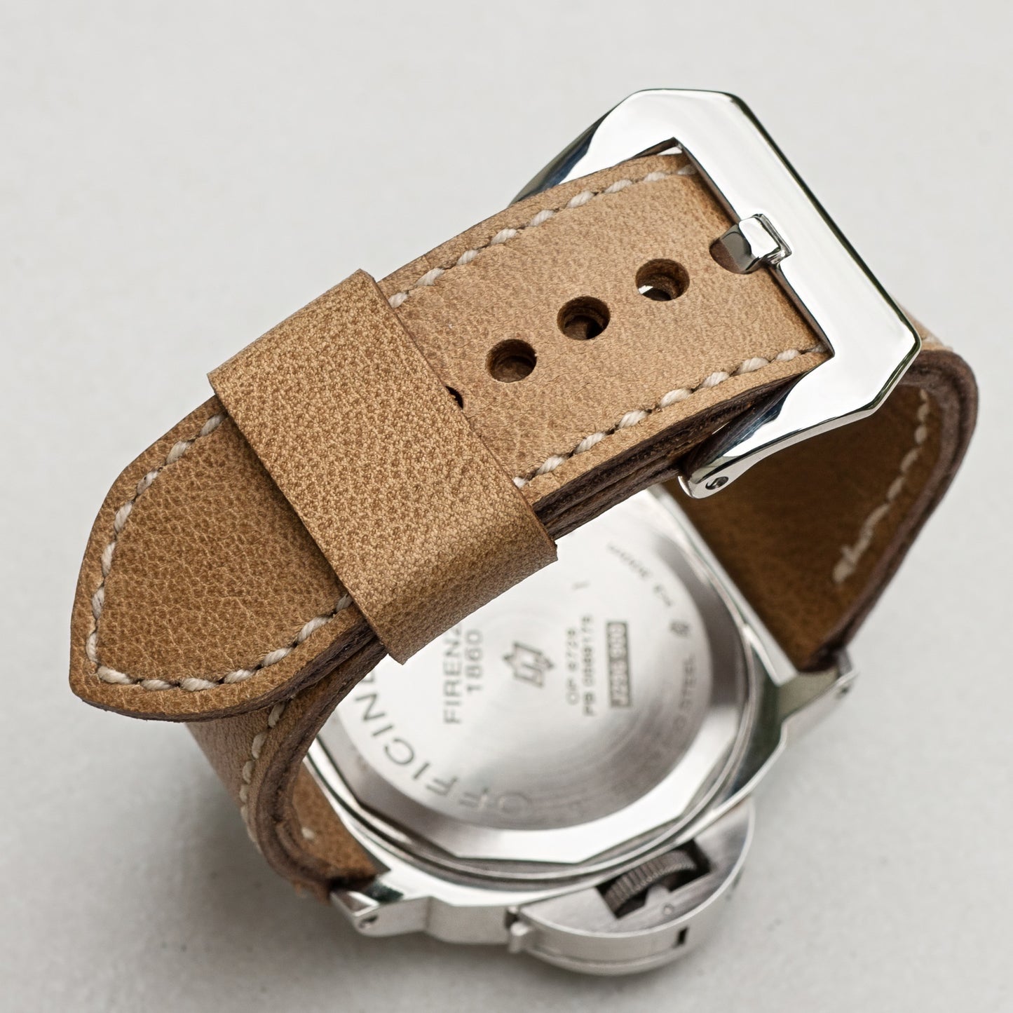 Sahara leather watch strap with natural stitching and polished steel buckle