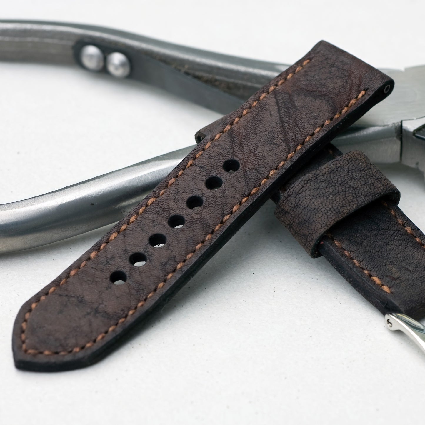 Shaman leather watch strap with butterscotch stitching and polished steel buckle