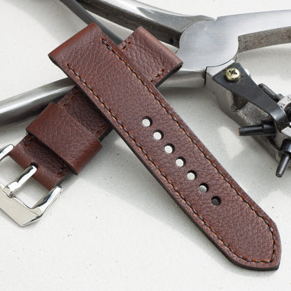Shooting Brake leather watch strap with dark brown stitching and polished steel buckle