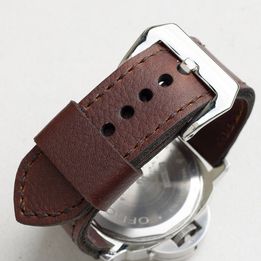 Shooting Brake leather watch strap with dark brown stitching and polished steel buckle