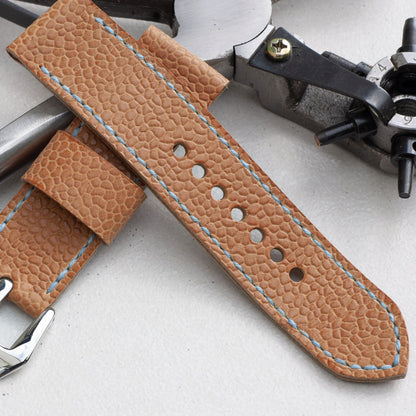 Tuscany leather watch strap with pale blue stitching and polished steel buckle