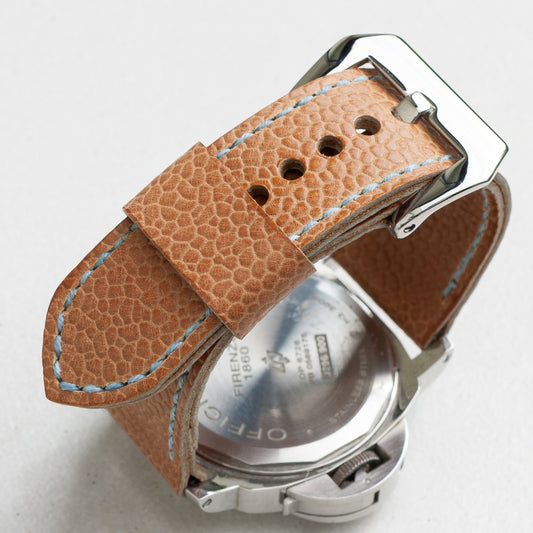 Tuscany leather watch strap with pale blue stitching and polished steel buckle