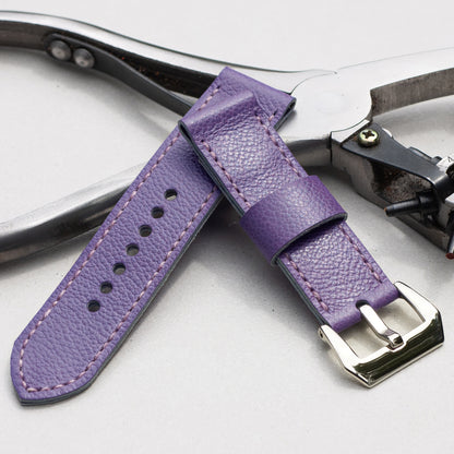 Ultraviolet leather watch strap with lavender stitching and polished steel buckle