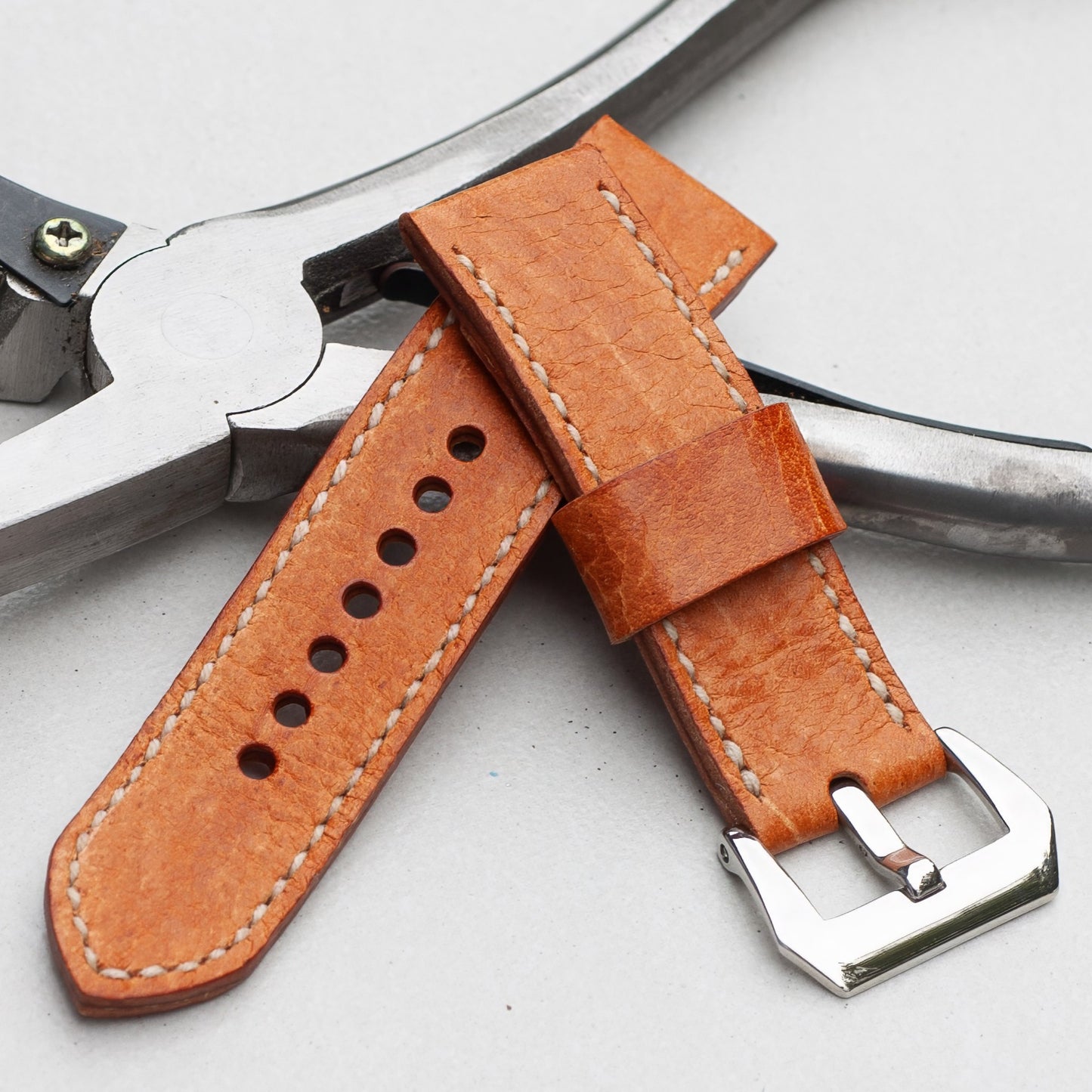 Vintage Stag leather watch strap with natural stitching and polished steel buckle