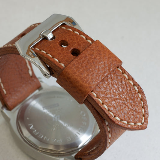 Whisky leather watch strap with natural stitching and polished steel buckle