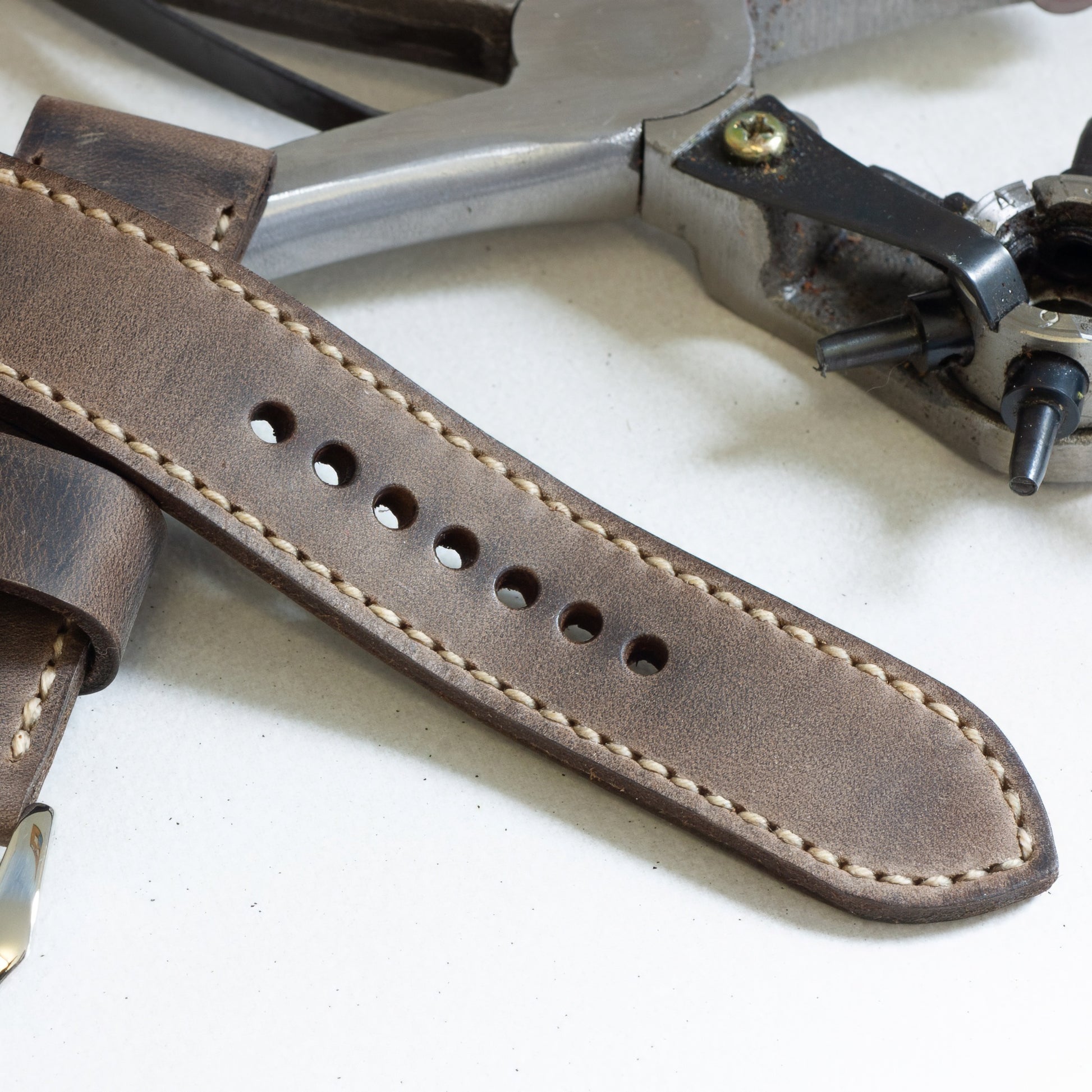 Zombie leather watch strap with natural stitching and polished steel buckle