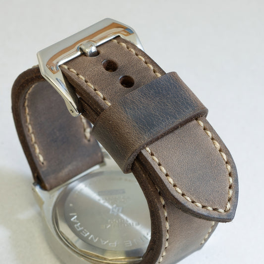 Zombie leather watch strap with natural stitching and polished steel buckle