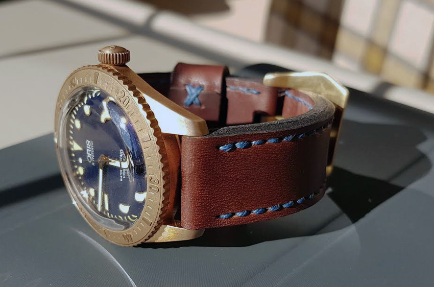 Oris Carl Brashear on Heavy Horse leather with royal blue stitching. © Colin Crewther