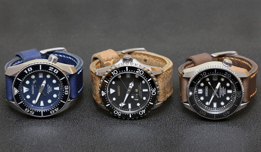 A trio of Seiko. Scuba on Lapis blue leather with pale blue stitching, Grand Seiko diver on African Kudu leather with butterscotch stitching, and MM300 on Crater leather with butterscotch stitching. © Michael Liao
