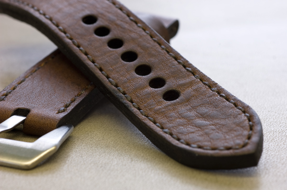 Horween Nut Brown leather with dark brown stitching.