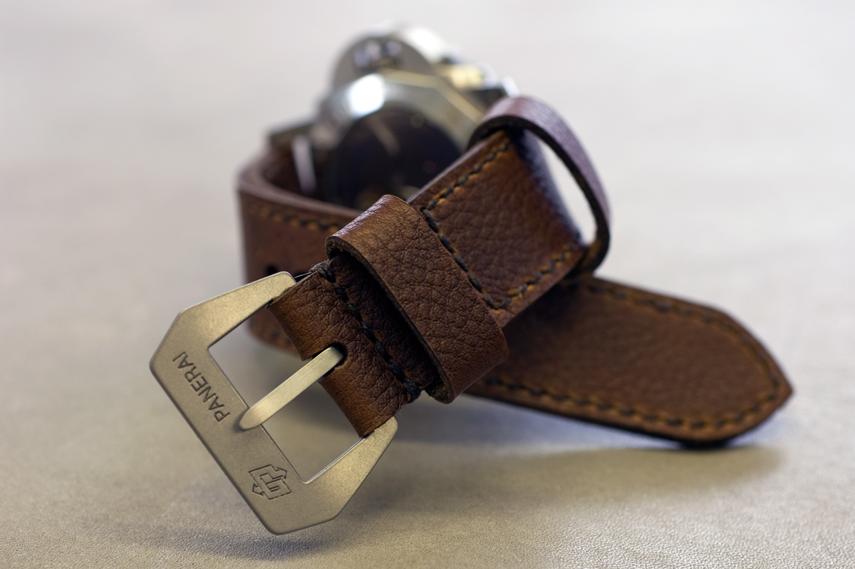 Shooting Brake leather with dark brown stitching and a handmade curved Pre-V buckle