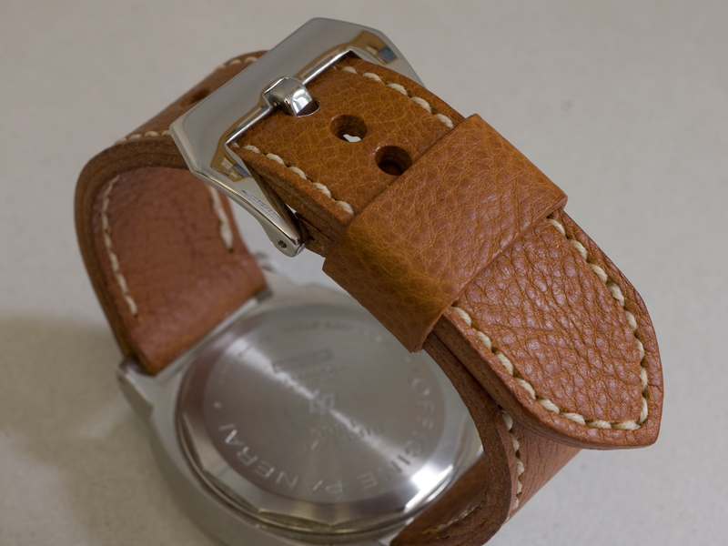 Whisky leather with natural stitching